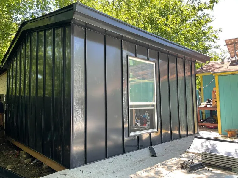 Black standing seam metal wall panels for Metal Roof Installation in Lake of the Pines
